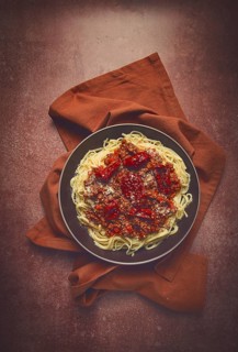Spaghetti bolognese, with dried tomatoes, homemade, close-up