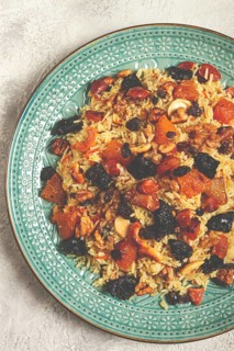 Rice dish, with the addition of dried fruits, nuts and spices of Middle Eastern cuisine, homemade,