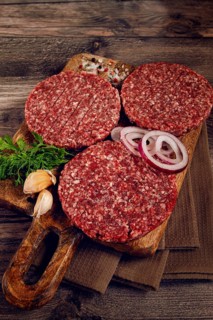 Raw cutlets, for burgers, minced meat, handmade, homemade, with spices, top view, no people