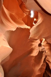 Light transmission through narrow openings in the curved sandstone canyons of a sandstone canyon,