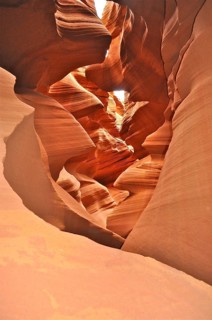 Warm lit sandstone with wonderful forms of natural erosions on a sunny day, Antelope Canyon, Navajo