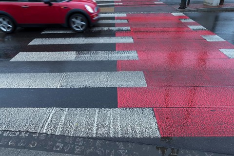 Rain-wet white red zebra stripes, Krakow, Poland