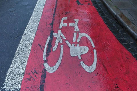 Red marked bicycle path, Krakow, Poland