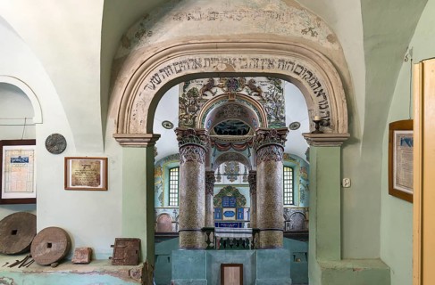 Entrance gate and view of the secular synagogue in Lancut formerly Landshut, Poland