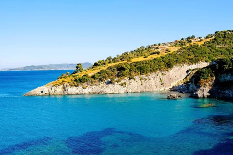 Xigia Beach, often referred to as Sulfur Beach, is a truly unique and therapeutic coastal spot on