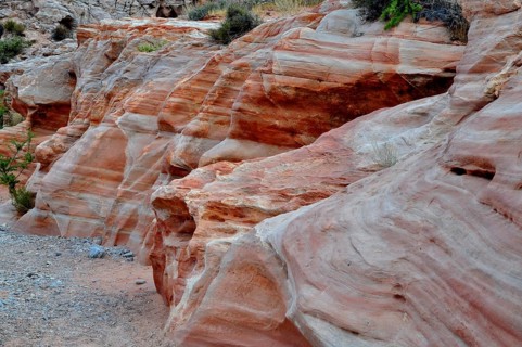 Close-up of detailed, erosion-shaped red and gray rocks with various layers and textures, Valley of