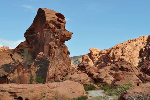 Large red sandstone rock formation in the desert with clear sky in the background, Valley of Fire
