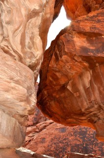 Impressive red sandstone rock formation in a narrow gorge under direct sunlight, Valley of Fire