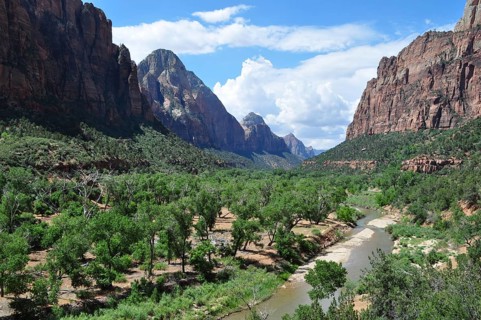 Impressive mountain landscape with river, green trees and clouds, Zion National Park, Utah, USA