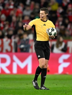 Referee Daniel Siebert with match ball gesture soccer Bundesliga, DFB-Pokal, Allianz Arena, Munich,