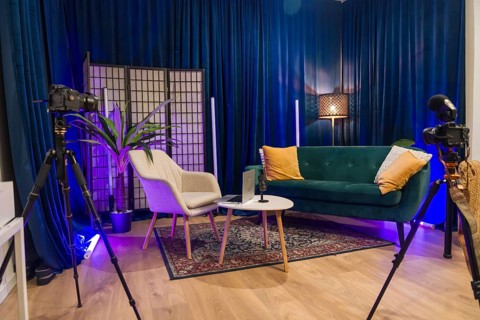 Modern content creation studio equipped for podcast recording or social media video production,