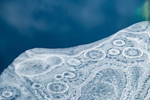 Abstract patterns in the ice of the partly frozen Königssee, detailed view, Berchtesgaden National