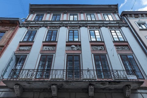 Four seasons house with twelve zodiac signs, the four seasons and Chronos reliefs, Lviv, Ukraine