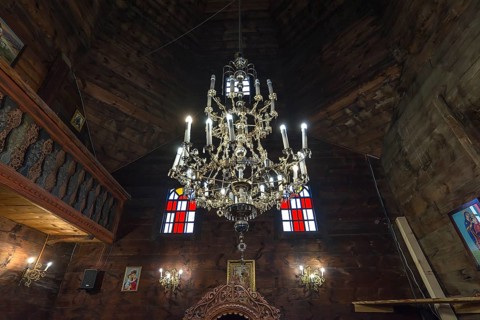 Silver candlestick in the historic wooden Trinity Church, Zhovkva city, Ukraine