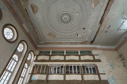 The destroyed interior of the Hasidic Synagogue, including Jacob Gansel Schul, is being restored,