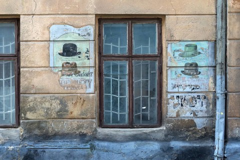 Wall painting at a former Jewish hat shop in the Jewish Quarter in Lemberg, Ukraine