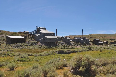 Abandoned building with chimneys in a ghost town, Gold Mine, Bodie Ghost Town, California, USA