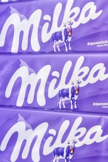 Milka chocolate 90g bar chocolate bar alpine milk chocolate background with logo in Stuttgart,
