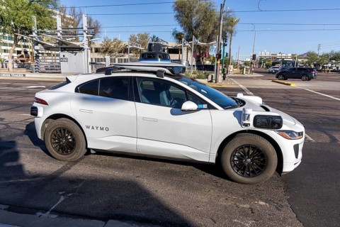 Waymo self-driving autonomous vehicle driverless car from Google and Jaguar Robotaxi in Phoenix,