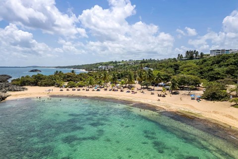 Mar Chiquita Beach in the Caribbean Ocean vacation Aerial view from above in Manati, Puerto Rico