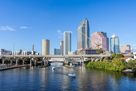 Tampa skyline with skyscrapers and bridge over Hillsborough River downtown in Tampa, USA