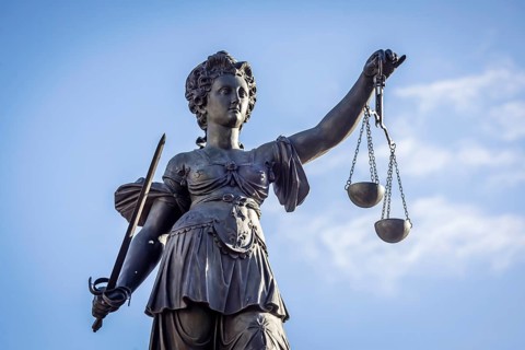 Justice, statue of the Roman goddess of justice. Römerberg, Downtown Frankfurt am Main, Hesse,