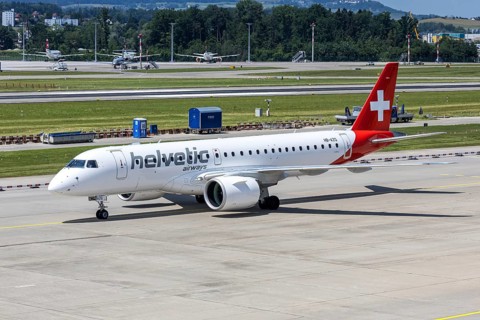 An Embraer 190 E2 Helvetic Airways aircraft with the HB-AZG license plate at Zurich Airport,
