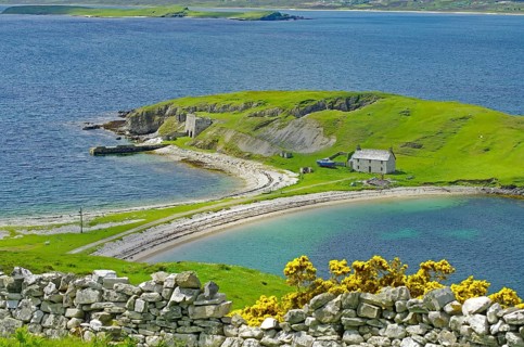 Tranquility by the sea with green landscape, stone house and gentle waves, Tongue, Highlands, West
