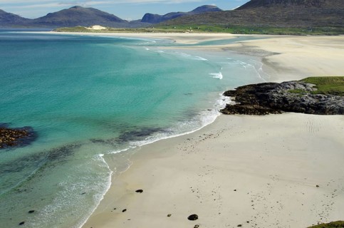 Extensive, pristine sandy beach with turquoise water and gentle waves, Isle of Harris, Outer