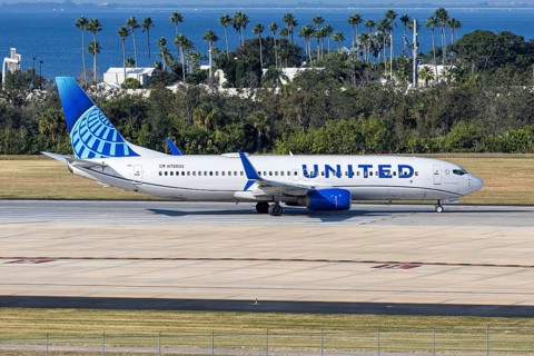 A United Airlines Boeing 737-800 aircraft with license plate N76502 at Tampa airport, USA