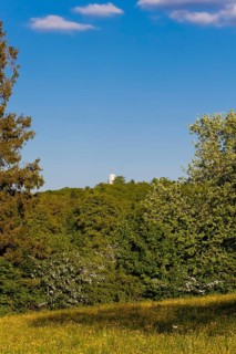 Lime kiln near the fog cave, Lichtenstein Castle in the back, Württemberg fairytale castle,
