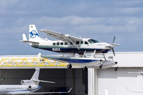 A Tropic Ocean Airways Cessna 208B Grand Caravan EX aircraft with license plate N501EX at Fort