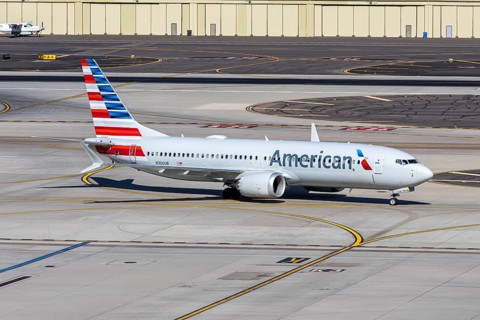An American Airlines Boeing 737-8 MAX aircraft with the license plate N300UB at Phoenix airport,