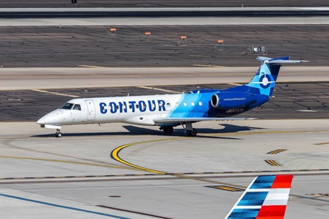 A Contour Airlines Embraer 135 aircraft with license plate N11526 at Phoenix airport, USA