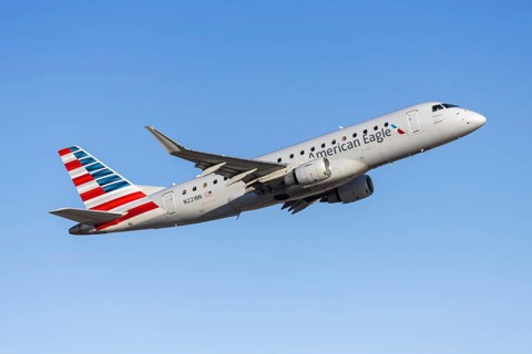 An American Eagle Embraer 175 aircraft operated by Envoy Air with license plate N221NN at Phoenix