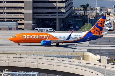 A Sun Country Airlines Boeing 737-800 aircraft with license plate N838SY at Phoenix airport, United