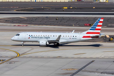 An American Eagle Embraer 175 aircraft operated by Envoy Air with license plate N317TB at Phoenix
