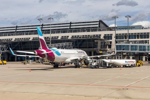 A Eurowings Europe Airbus A320 aircraft with the license plate 9H-EWC at the airport in Stuttgart,