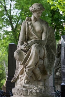 Female sculpture, hands folded, Lützenhofer cemetery Lychakivsky cemetery, Lviv, Galicia, Ukraine