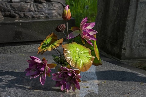 Artificial flower decoration on a grave, Lützenhofer cemetery Lychakivsky cemetery, Lviv, Galicia,