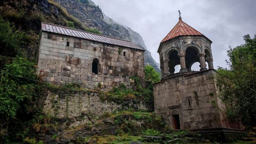 An old monastery with picturesque stone architecture nestled in a mountainous landscape, Debed