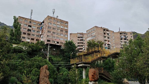 Several prefabricated residential buildings surrounded by nature and clouds, Alaverdi, Debed