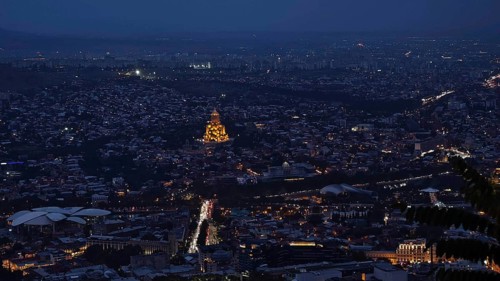 Nocturnal view of Tbilisi with illuminated buildings and roads, Tbilisi, Georgia