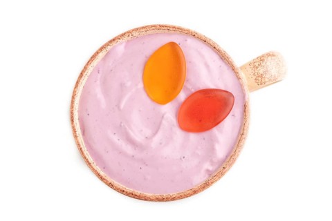 Purple Yogurt, with jelly candy isolated on white background, top view, flat lay, close up,