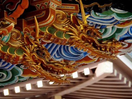 Close-up view of golden dragon sculptures with vivid colors, Narita-san Temple, Narita, Japan