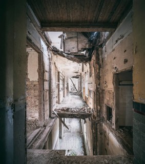 Long corridors and collapsed ceilings in a former sanatorium, Lost Place, Saxony-Anhalt, Germany