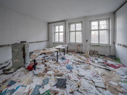 A room full of files lying around in an abandoned administration building, Lost Place,