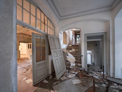 Staircase of an abandoned administration building full of rubble and trash, Lost Place,