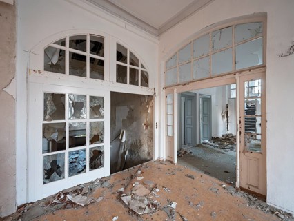 Staircase of an abandoned administration building full of rubble and shards, Lost Place,
