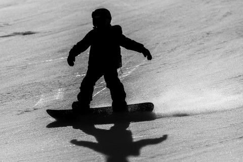 Symbolic photo of child snowboarding, Zweisimmen, Switzerland